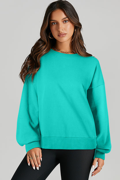 Valerian Solid O Neck High Low Hem Pullover Sweatshirt