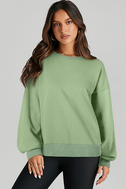 Valerian Solid O Neck High Low Hem Pullover Sweatshirt