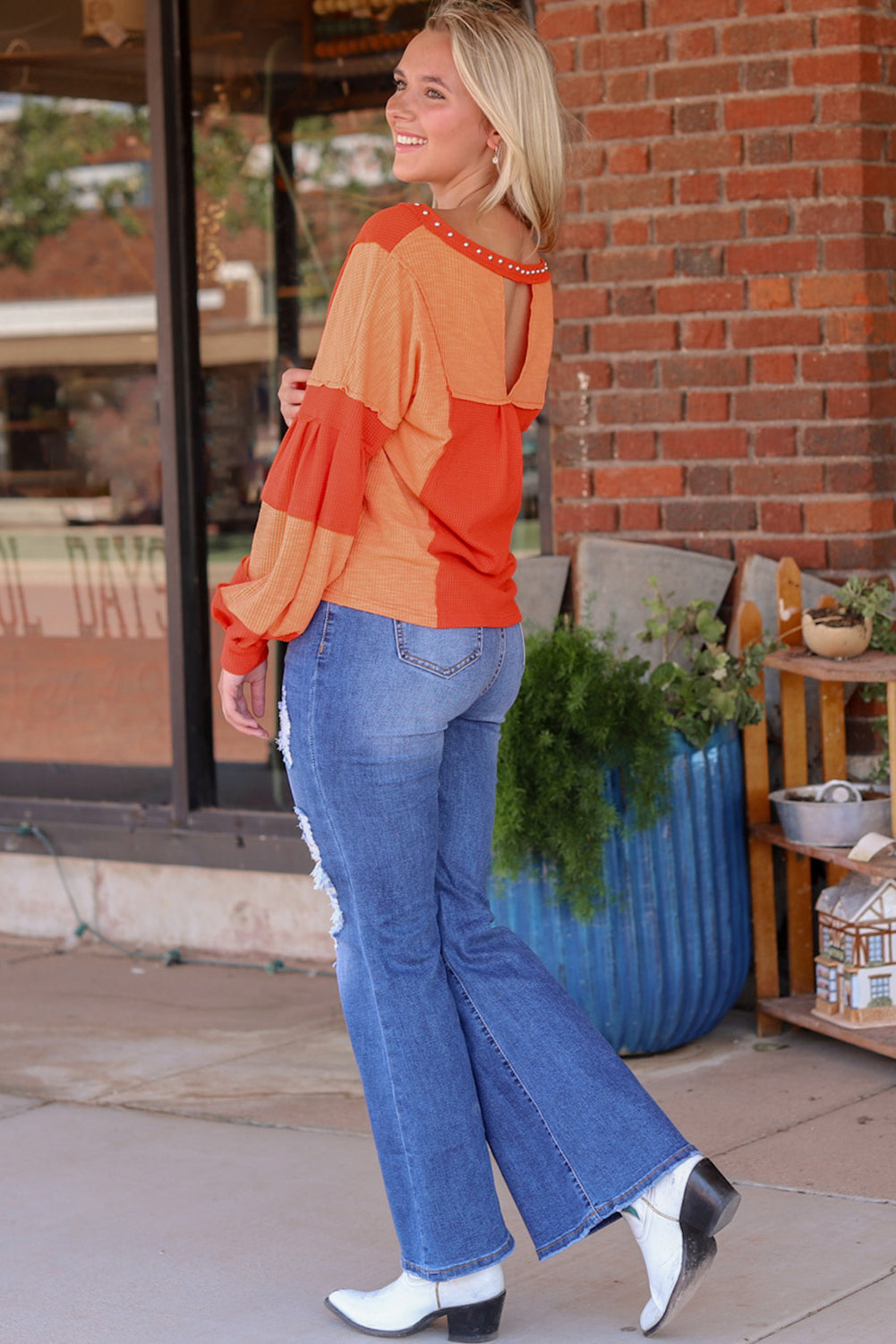 Fiery Red Studded V Neckline Exposed Seam Textured Knit Top